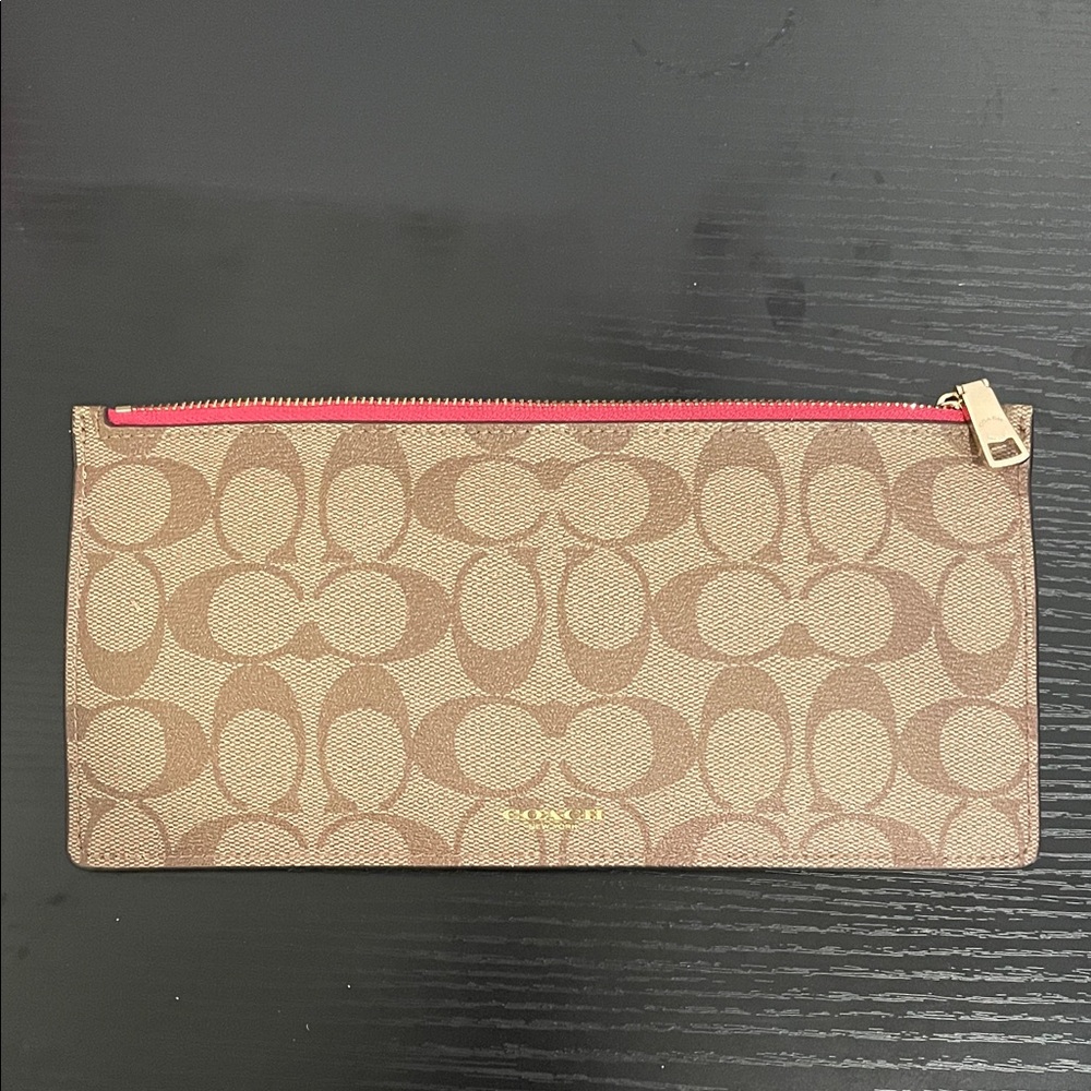 Coach Signature Brown Clutch with Pink Accent